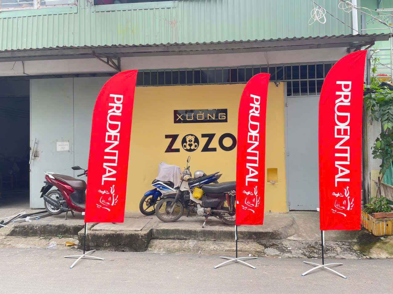 Xưởng in may cờ cánh buồm giá rẻ